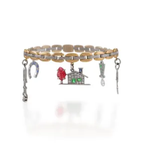 Cartier Gold and Platinum Link Gem-Set Charm Bracelet